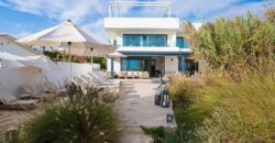 Stunning Frontline Beach 6 Bedroom 4 Bathroom Contemporary villa, located right on the beach at Costabella, East Marbella and only a 10 minute drive to the centre of Marbella and Puerto Banus.